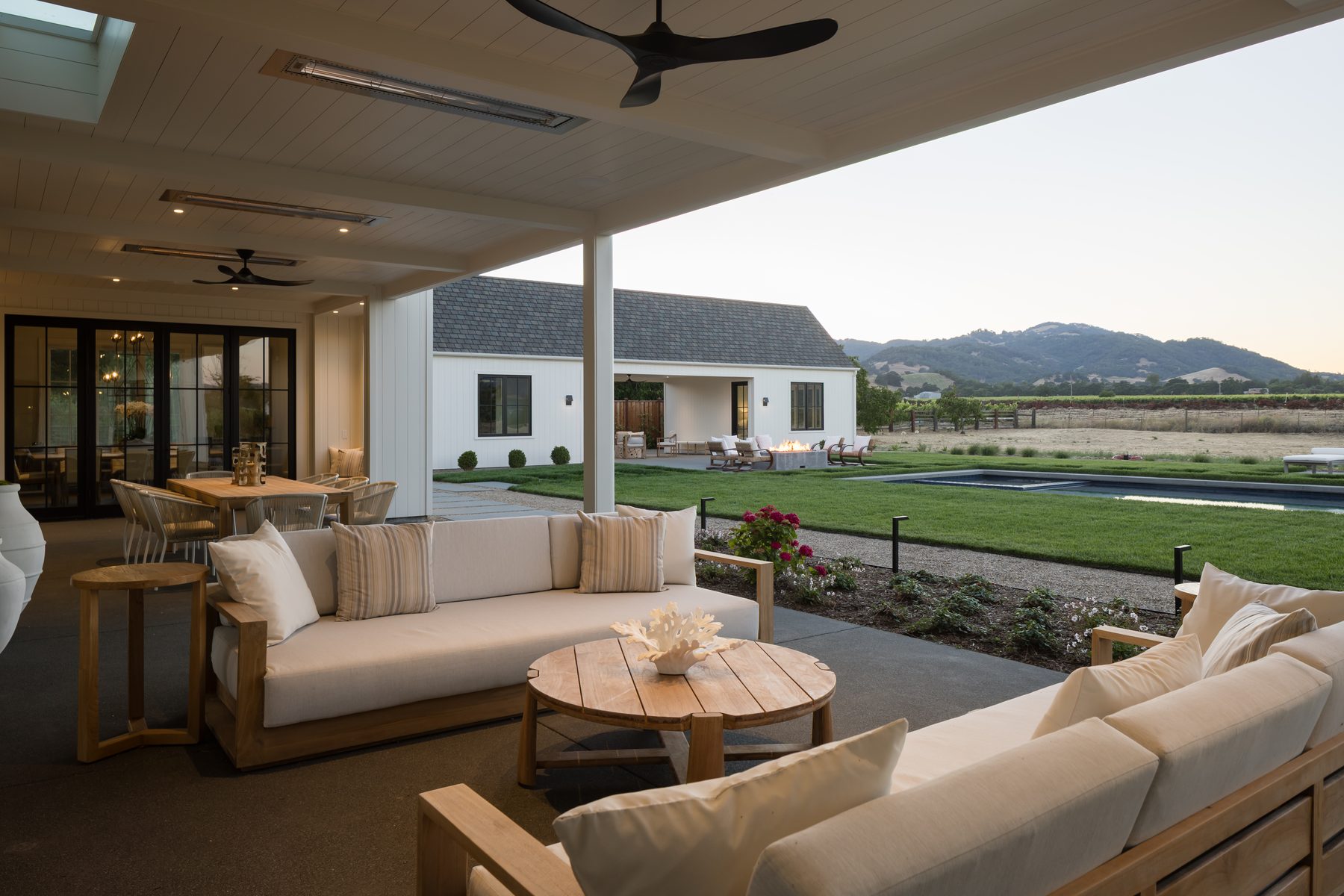 Pool and spa with vineyard backdrop